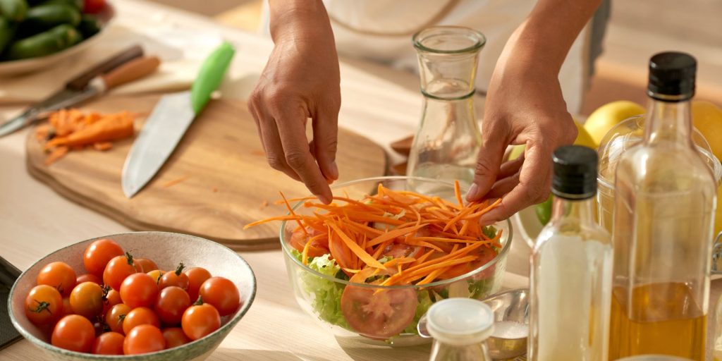 food-blogger-preparing-vegetable-salad-2021-08-27-11-00-11-utc.jpg